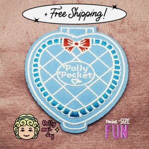 This Polly Pocket Blue Heart Shape Play Case Iron-on Patch